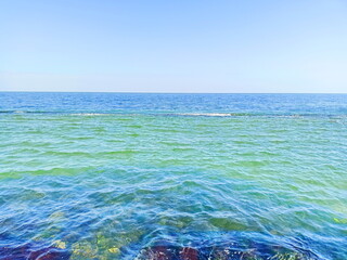 Unsurpassed multi-colored palette of the sea blue of the Black Sea coast on a clear sunny day.