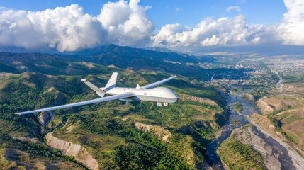 Surveillance drone gliding over green mountains and a winding river near a vibrant city under a bright blue sky filled with fluffy clouds