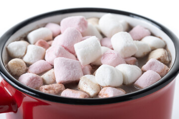 Hot chocolate drink with marshmallows in red mug. Close up
