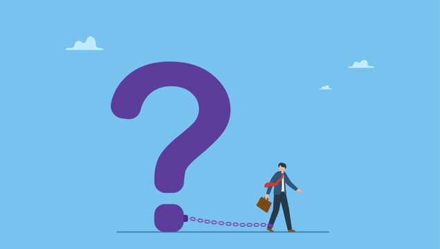 Frustrated businessman chained with huge large question mark burden. Struggle with unanswered question, problem or difficulty, hard questions or unsolvable quest.