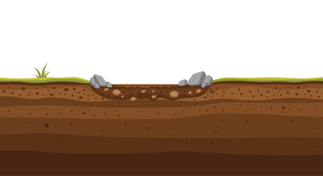 Rich layers of earth and soil, revealing geological structure with embedded rocks and grassy surface