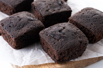 Homemade chocolate brownies isolated on white background