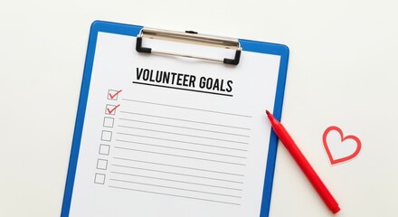A checklist for volunteer goals on a clipboard with red checkmarks. Charity, community service, and planning concept. Flat lay with copy space for text