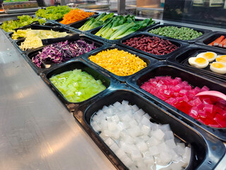 salad bar in supermarket. healthy food.
