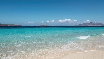 Obraz premium Beach scene featuring the ocean with distant islands, seasonal change