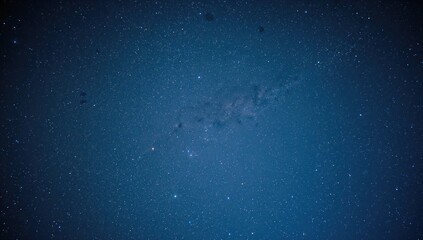 Long exposure night shot of the Milky Way with grainy texture and soft focus