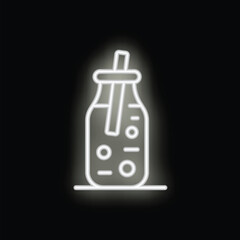 White neon sign depicting a glass of bubble tea with a straw in a dark setting