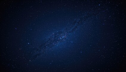 Fototapeta premium Dark blue night sky filled with stars and celestial bodies, cosmic wonder