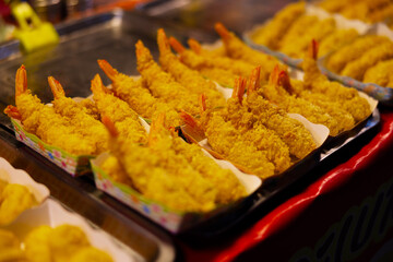 Golden fried tempura shrimp as authentic Thai street food in Koh Samui