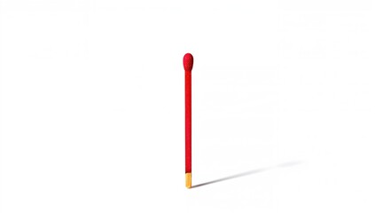 Macro shot of a single red matchstick against a plain white backdrop