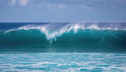 Blue ocean waves crashing and curling over each other