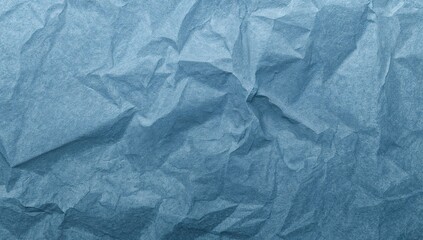 Obraz premium Denim-Colored Crinkled Paper Texture Background for Layout and Design Use