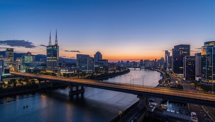 Evening skyline with river and train bridges leading to urban waterfront areas