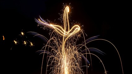Long-exposure shot capturing the vibrant, illuminated trails of fireworks against a dark sky