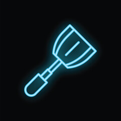 Neon sign of spatula glowing in the dark, representing cooking and food preparation