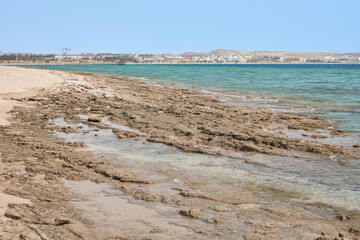 Beach and sea with a coastline of corals, Red Sea, Egypt.