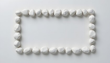 White Pebble Frame with Blank Center on Light Background
