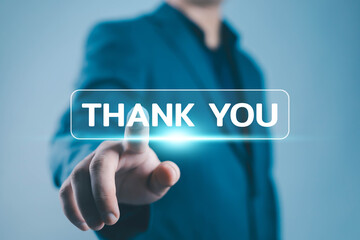 Businessman pressing virtual THANK YOU button on digital screen, symbolizing gratitude, appreciation, and positive communication in corporate or online business concept.
