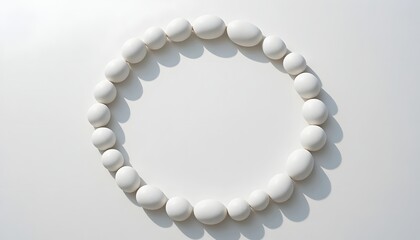 Circle Shape Made of White Pebbles on Minimal Background