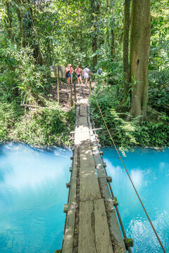 Suspension wooden bridge crossing Rio Celeste river, Costa Rica