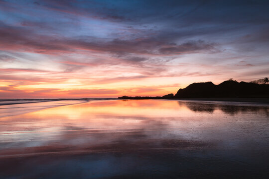 Colorful sunset over Nosara beach, Nicoya peninsula, Guanacaste, Costa Rica