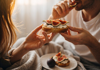 Romantic breakfast with fig toast and ricotta, cozy morning moment, sensory food experience, intimate couple scene, minimalist slow living visual, lifestyle branding with soft natural light