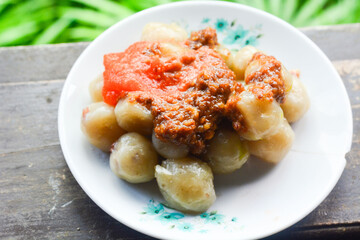 Cilok is made from tapioca or aci flour and served by plugging, cilok is a round shaped snack with a chewy texture and served with peanut sauce