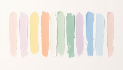 An array of pastel paint swatches meticulously arranged on a clean, bright surface creating a visually appealing texture and color palette © somruthai