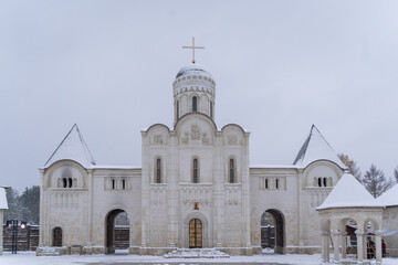 Snow-Covered White Church Facade in Winter Scene