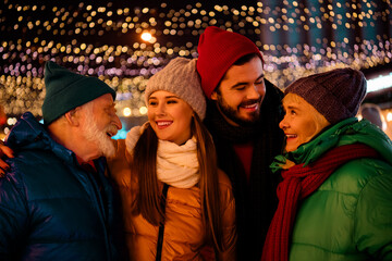 Holiday joy in a cozy family gathering under twinkling lights at the market during winter celebrations with friends and loved ones