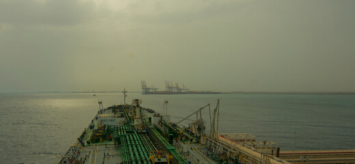 Cargo operation in progress in a Tanker ship at port