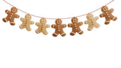 Brown gingerbread men cookies with white icing and candy accents, strung on a red line and isolated on transparent background, ideal for festive Christmas designs, holiday digital art, and cozy win