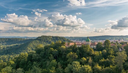 Church with green domes nestled in forested hills