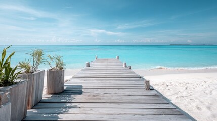 Obraz premium copy space on wooden pier on the tropical beach with white sand and turquoise ocean