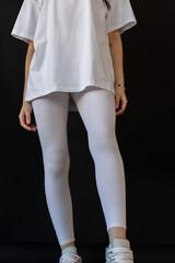 Model wearing white leggings highlighting shape, Mockup presenting waist and overall contour clearly
