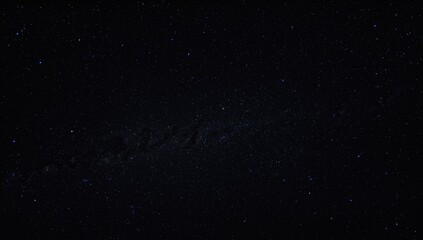 Fototapeta premium Beautiful night sky filled with numerous stars, perfect for astronomy enthusiasts