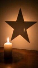 A softly glowing candle sits on a table, illuminating the space. Its warm light creates a striking star-shaped shadow on the wall, enhancing the evening's intimate atmosphere