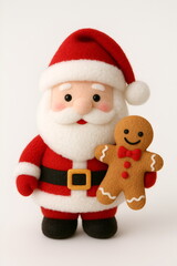 Fototapeta premium Adorable plush Santa Claus toy holding a gingerbread man, smiling sweetly against a bright white studio backdrop. This jolly holiday figure brings warmth, magic, classic Christmas joy, festive décor