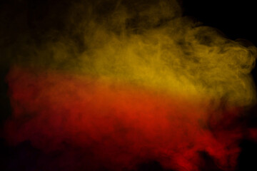 Orange and red steam on a black background.