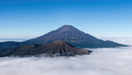 Dense mist blankets a towering volcanic peak at 4794 meters, surrounded by clouds under a vivid blue sky.