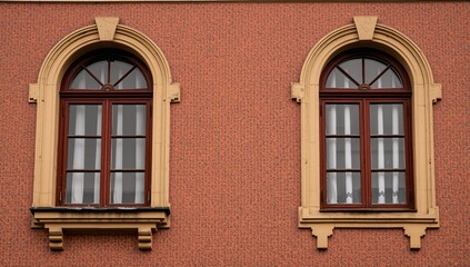 Fototapeta premium Architectural components such as windows, arches, and niches on urban streets, showcasing vintage patterns and textures on building facades.