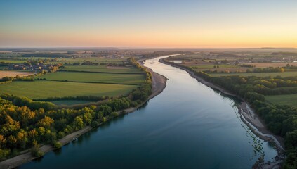 Aerial view of a river in France, showcasing seasonal change