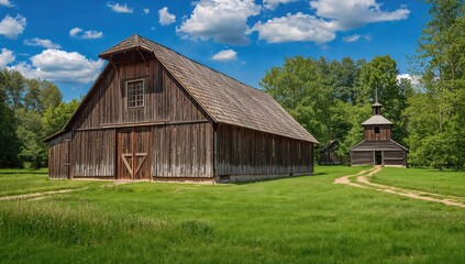 Obraz premium Traditional Ukrainian rural wooden barn and church, showcasing architectural heritage, preservation
