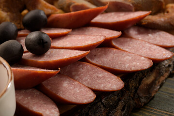 assorted pork meat on a wooden bottom