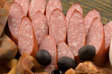 assorted pork meat on a wooden bottom