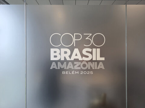 COP 30 Brasil Amazonia Belem 2025 logo on a indoor window.