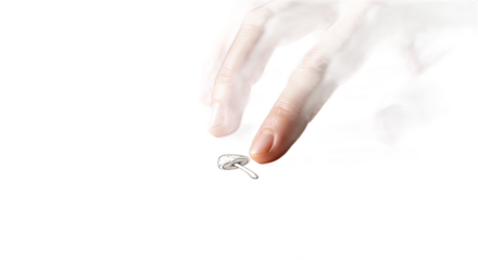 A hand about to pick a mushroom