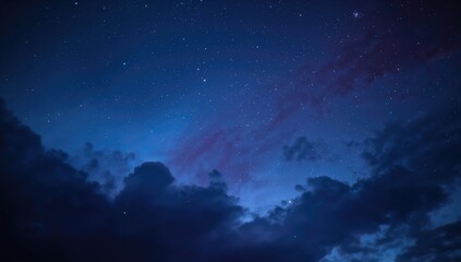 Fototapeta premium Wavy clouds against a starry night sky, ideal for editorial backgrounds