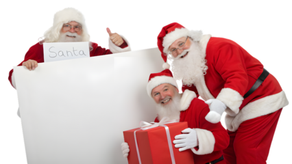 Three happy santas claus with a blank sign and gift, isolated on transparent background