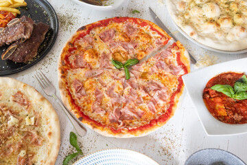 Italian food variety on wooden table for dinner